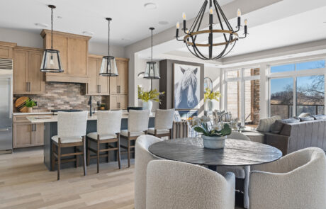 Hill Farm #210 Staged view of dining, living, and kitchen