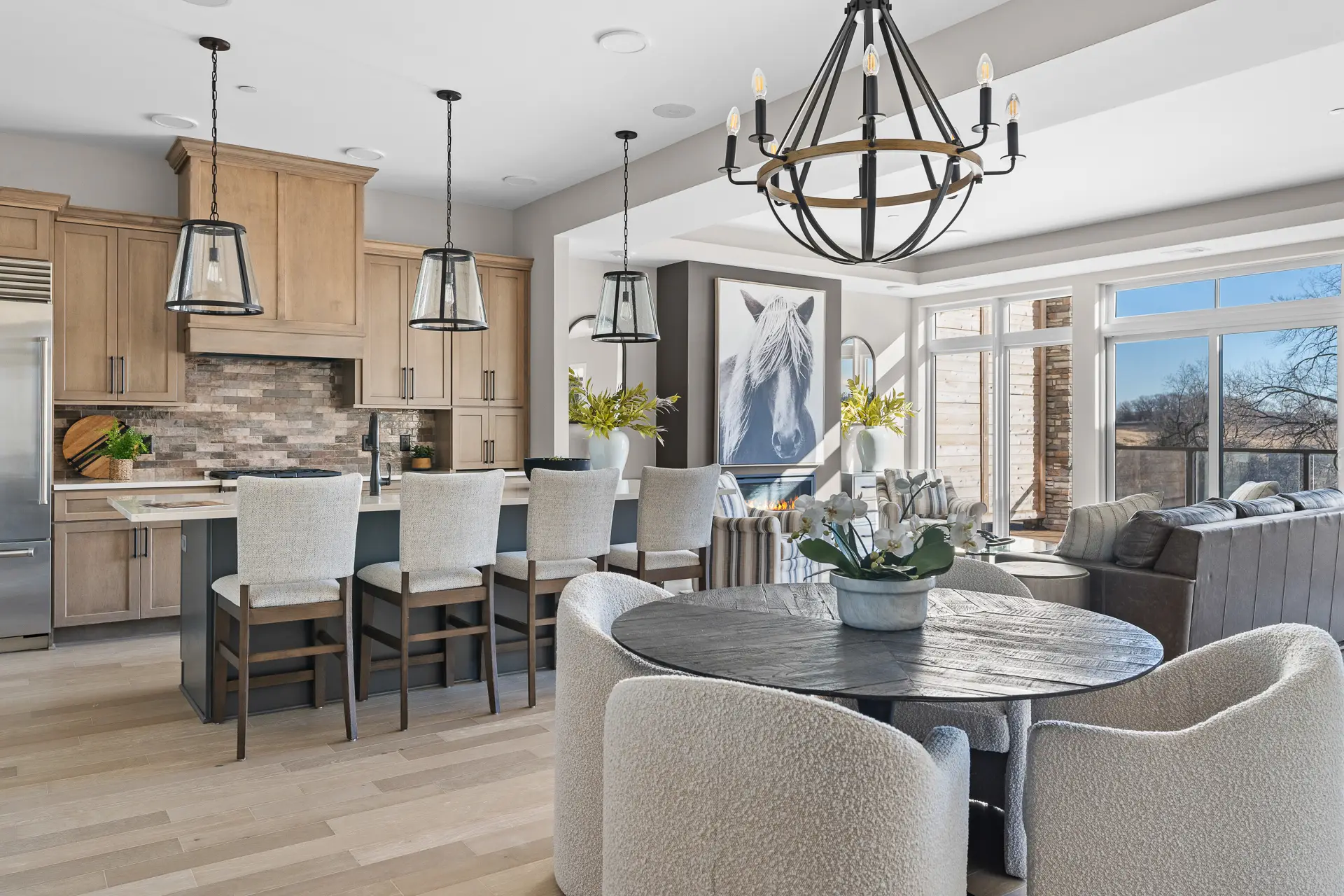 Hill Farm #210 Staged view of dining, living, and kitchen